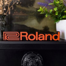 Roland synthesiser logo - -,