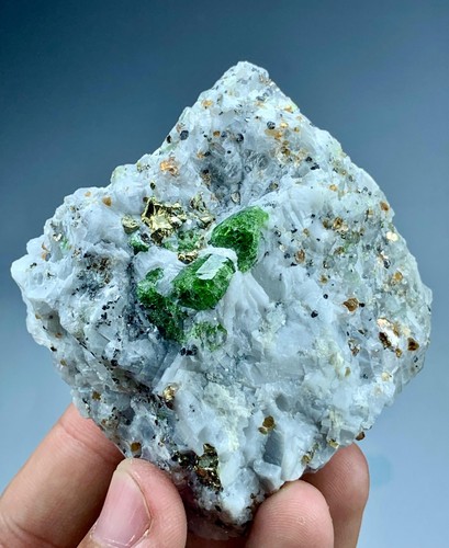 Green garnet with - pyrite, and