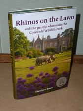 Rhinos On The Lawn And The