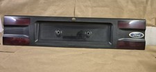 FORD GRANADA COSWORTH REAR NUMBER PLATE SURROUND TRIM 82GBA423A40AC