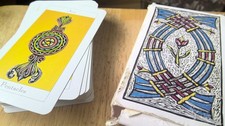 THREE PACKS OF TAROT CARDS AND TWO BOOKS..RIDER WAITE..IGLOO BOOKS..JONATHON DEE
