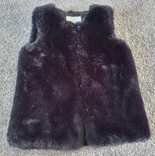 Girls Black Fluffy Gilet. Age