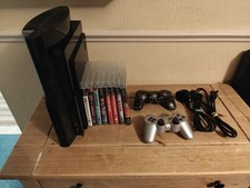 Sony PlayStation 3 80GB Console Bundle W/8 Games