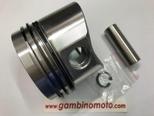 Complete engine piston