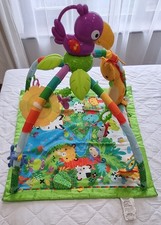 Fisher-Price Playmat Rainforest Music & Lights Deluxe Gym with 10+ Toys, RRP £82