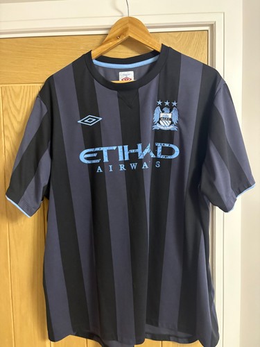 Man city third - man,