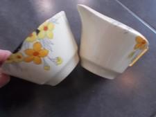 VINTAGE CROWN DUCAL MILK JUG AND SUGAR BOWL SUNBURST DESIGN