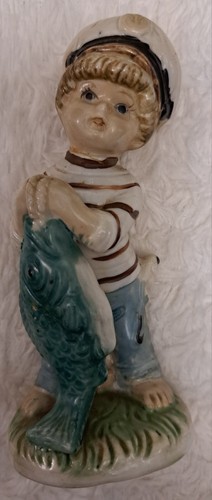 Vintage little boy catch big - little,
