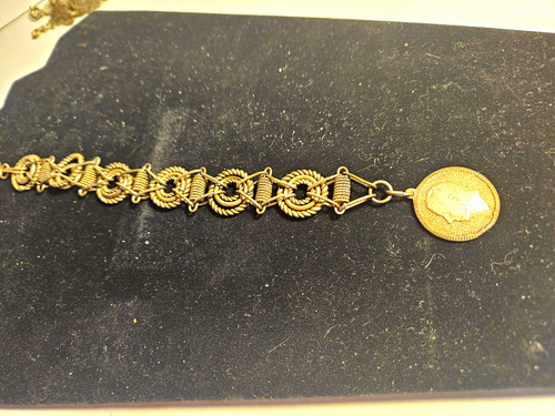 Gold tone round - tone,