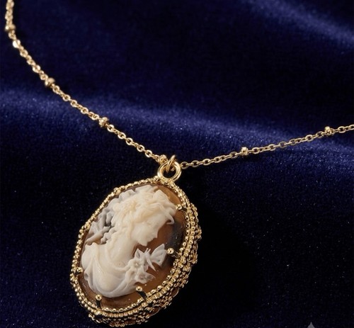 Gold tone oval - gold, cameo