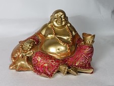 Gold Statue of the Laughing