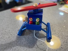 Wooden toy helicopter with