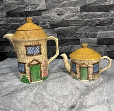 Pair of Sylva Cottage Teapots