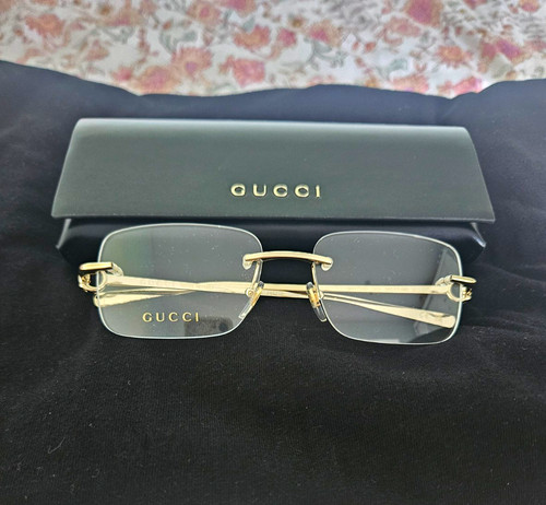 Gucci gg1703o gold rimless - gucci,