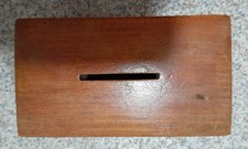 small rare vintage wooden money box with flip panel on base, for coin removal