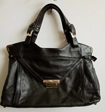 Stylish Kooba Black Leather Ladies Handbag With Gold Accents & Purple Lining?