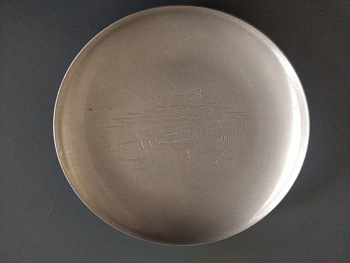 Metal plate featuring - metal, an