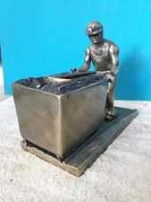 Vintage Sculpture In Solid