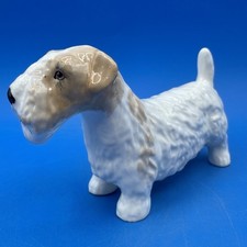 VINTAGE  FIGURINE OF A