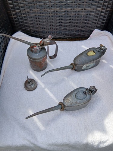 Vintage oil cans - cans, x