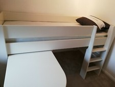 Children`s bed with pull out desk 