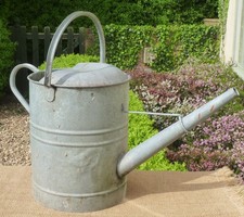 Galvanised metal watering can