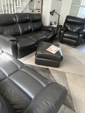 Harvey’s Grey Leather Sofa