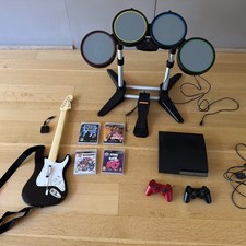 Rock Band Drum Kit and Guitar with dongle and PS3 with controllers and games