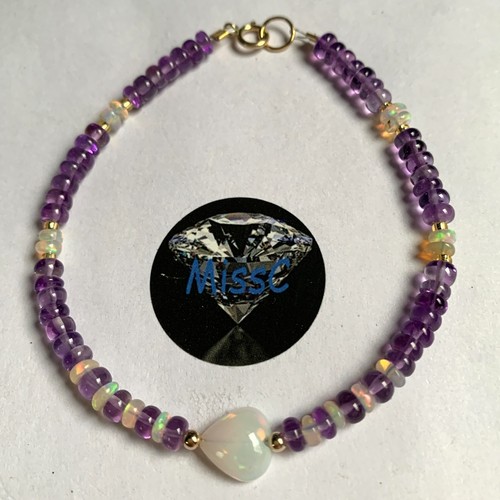 9ct gold amethyst and fire - and,