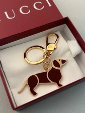 GUCCI Metal dog accented with