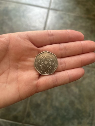 Rare 50p coin celebrating one - celebrating,
