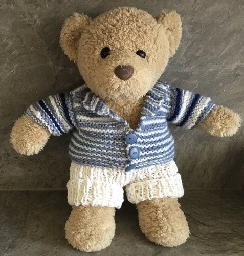 Hand knitted teddy bear - hand,