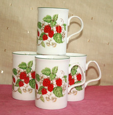 FOUR FINE BONE CHINA MUGS, ROY