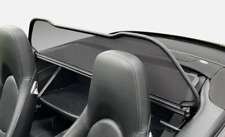 Wind deflector fits a Porsche