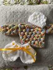 Hand Knitted dolls clothes to