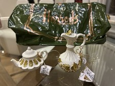 Two miniature Golden tea cups