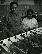1991 Press Photo Volunteer Virginia Walker-Riley enjoys game of table-top soccer