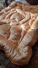 Vintage gold satin eiderdown feather filled bedspread Stunning 60in x 42in.