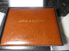 Real Leather Dk Tan Addresses