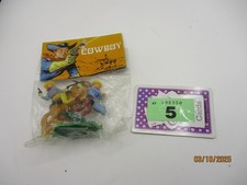 Plastic cowboy figures - , in
