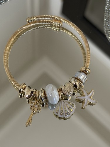 Gold and white starfish - and,