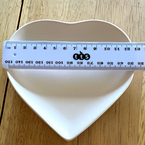 White heart shaped ceramic - shaped,
