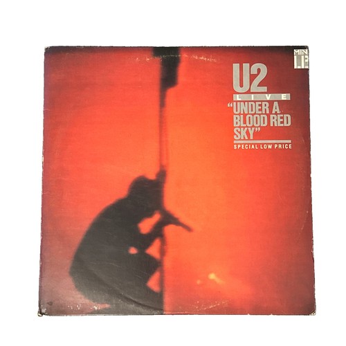 Live under a blood red - -,