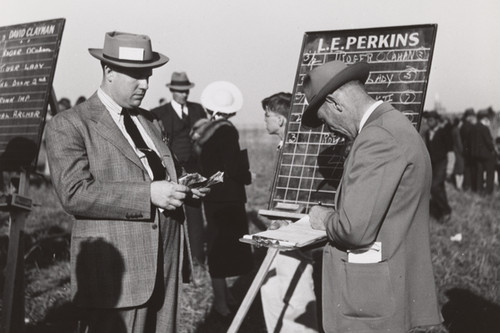 Bookies taking bets horse - bookies,