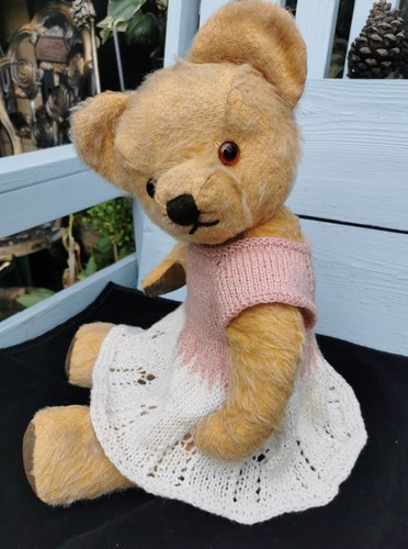 Hand knitted teddy bear