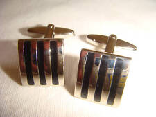 Rhodium cuff links.  3 black