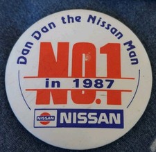 DAN DAN THE NISSAN MAN Vintage 1987 Advertising Pin Badge 55mm Cars Automobilia 