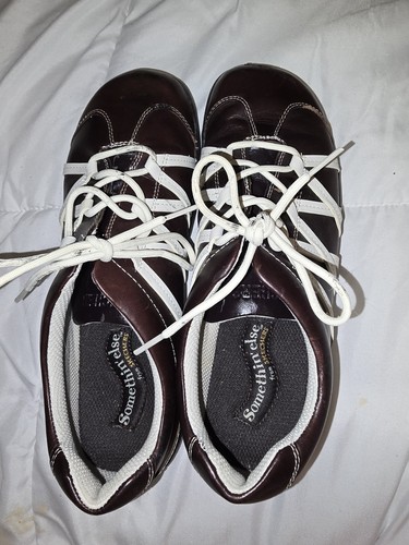 Skechers something else - something,