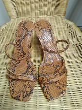 Zara Tan/Black Faux Leather