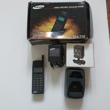 Samsung SH710  Rare  mobile cellular phone includes charger base. 1995 see notes